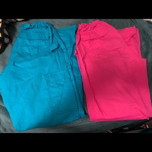 Two pairs of koi scrub pants